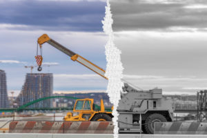 Truck crane construction with dramatic cloudy sky on the bridge in the city